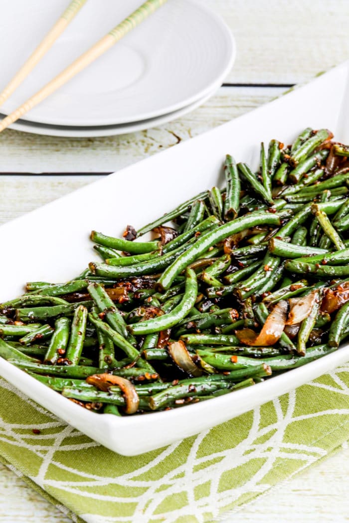 Garlicky Green Beans Stir Fry farther away shot of green beans on serving dish