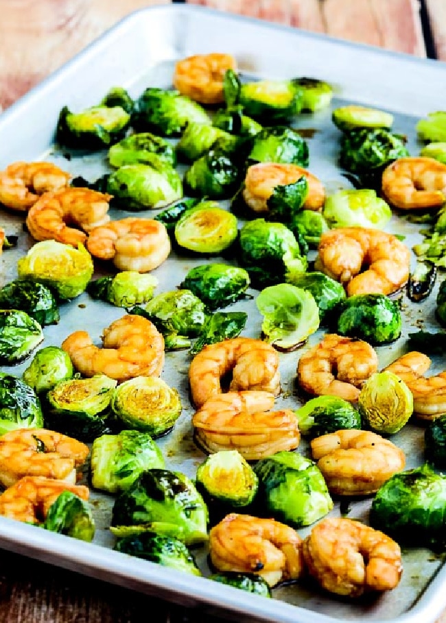 Roasted Asian Shrimp and Brussels Sprouts Sheet Pan Meal close-up photo of shrimp and brussels sprouts on baking pan