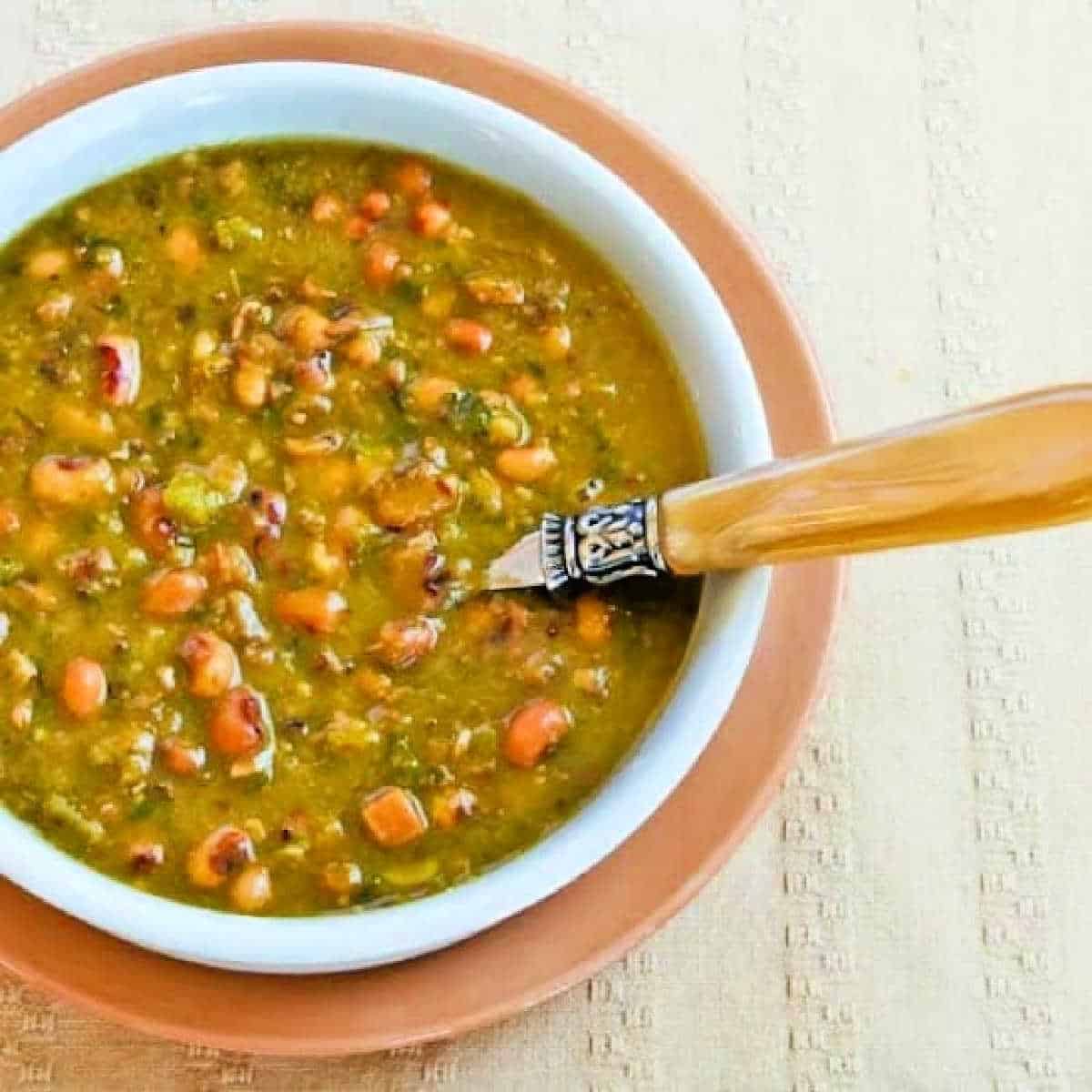 square image of Hopping John Soup in soup bowl with spoon
