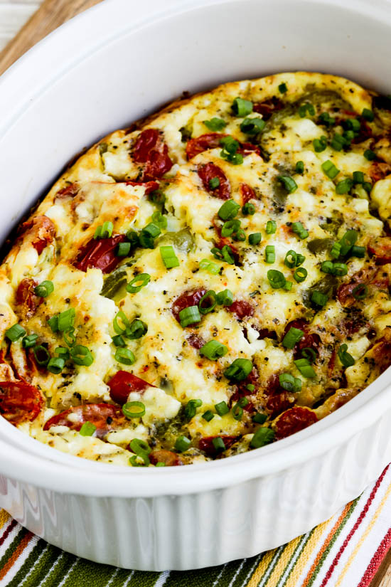 Roasted Green Pepper and Tomato Breakfast Casserole with Feta showing finished breakfast casserole in baking dish